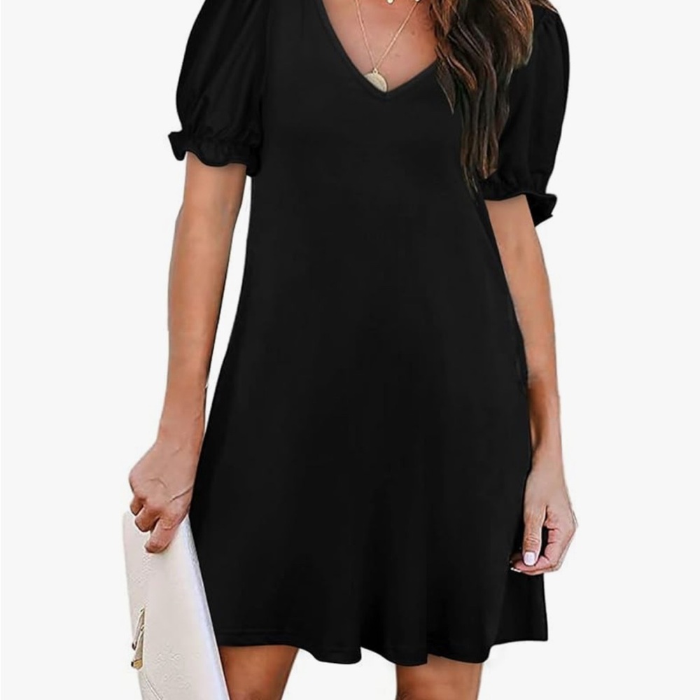 Elegant Black Puff Sleeve Dress with pockets NWOT